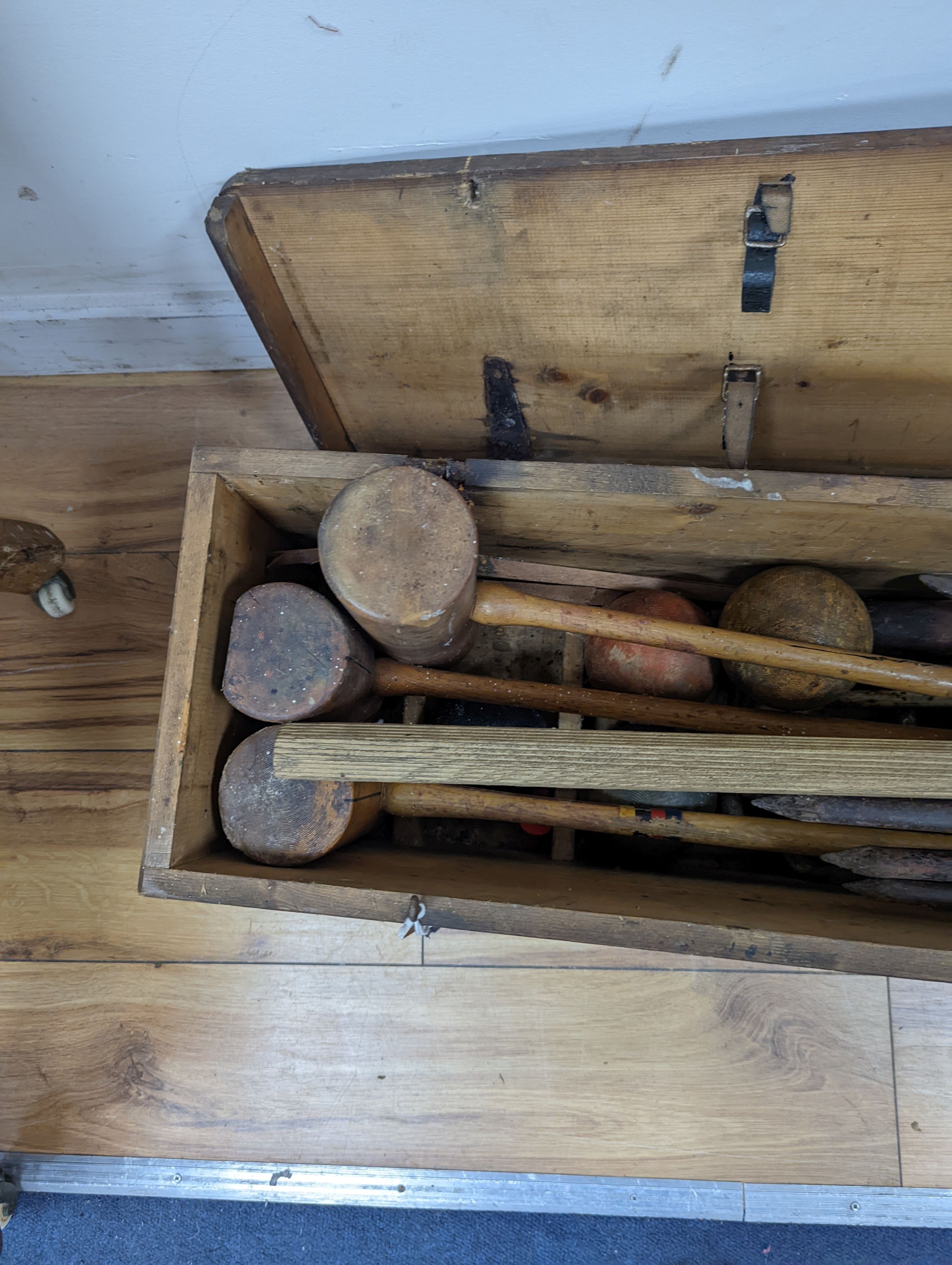A vintage croquet set in original box